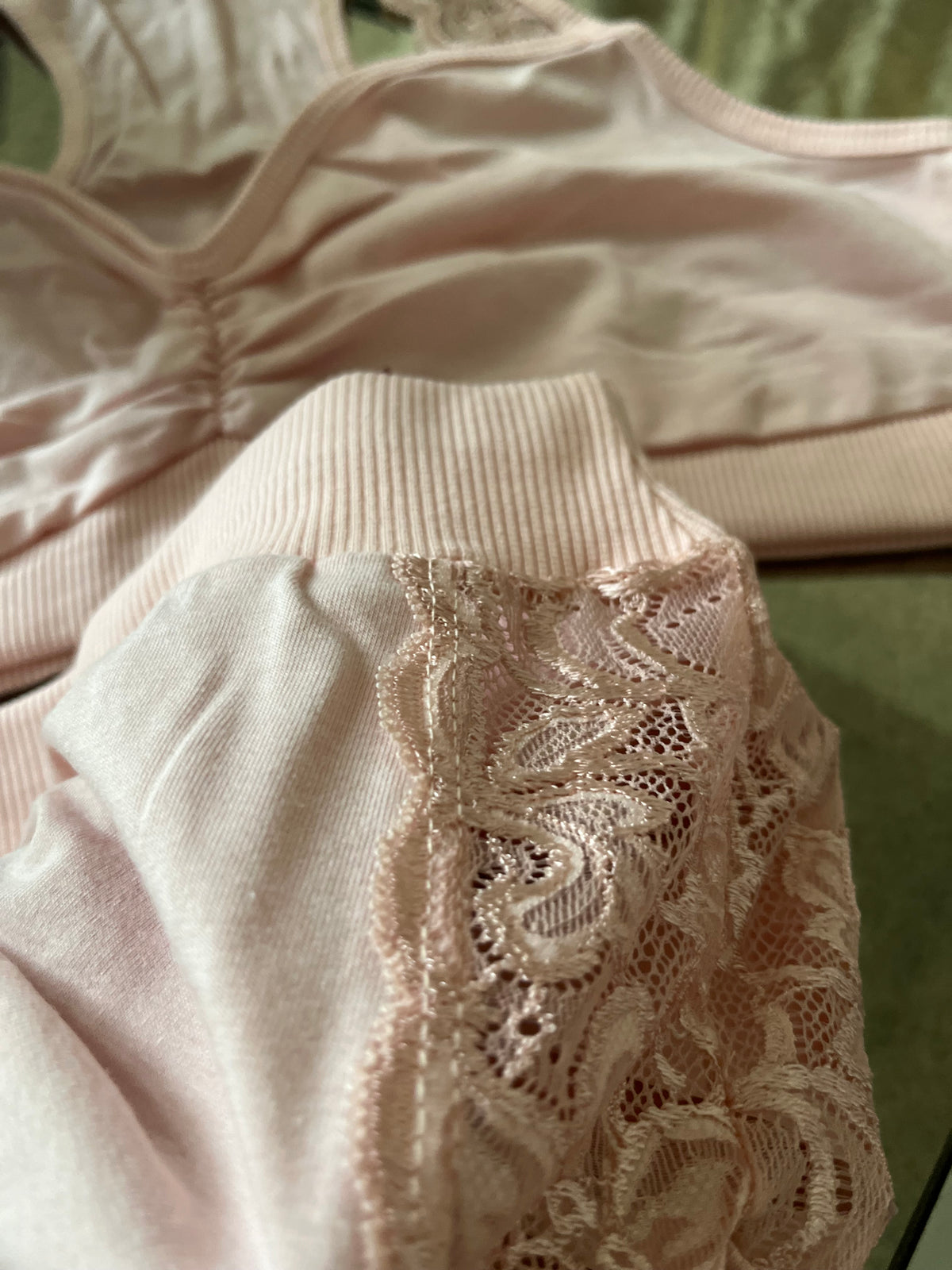 Close up of ribbed knit fabric texture on blush lounge set