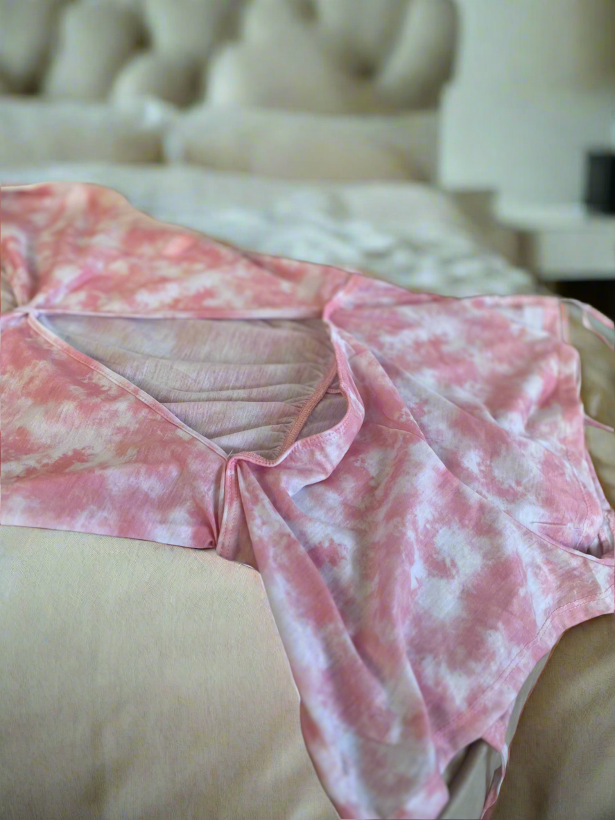 Side drawstring detail on pink tie dye sleep romper