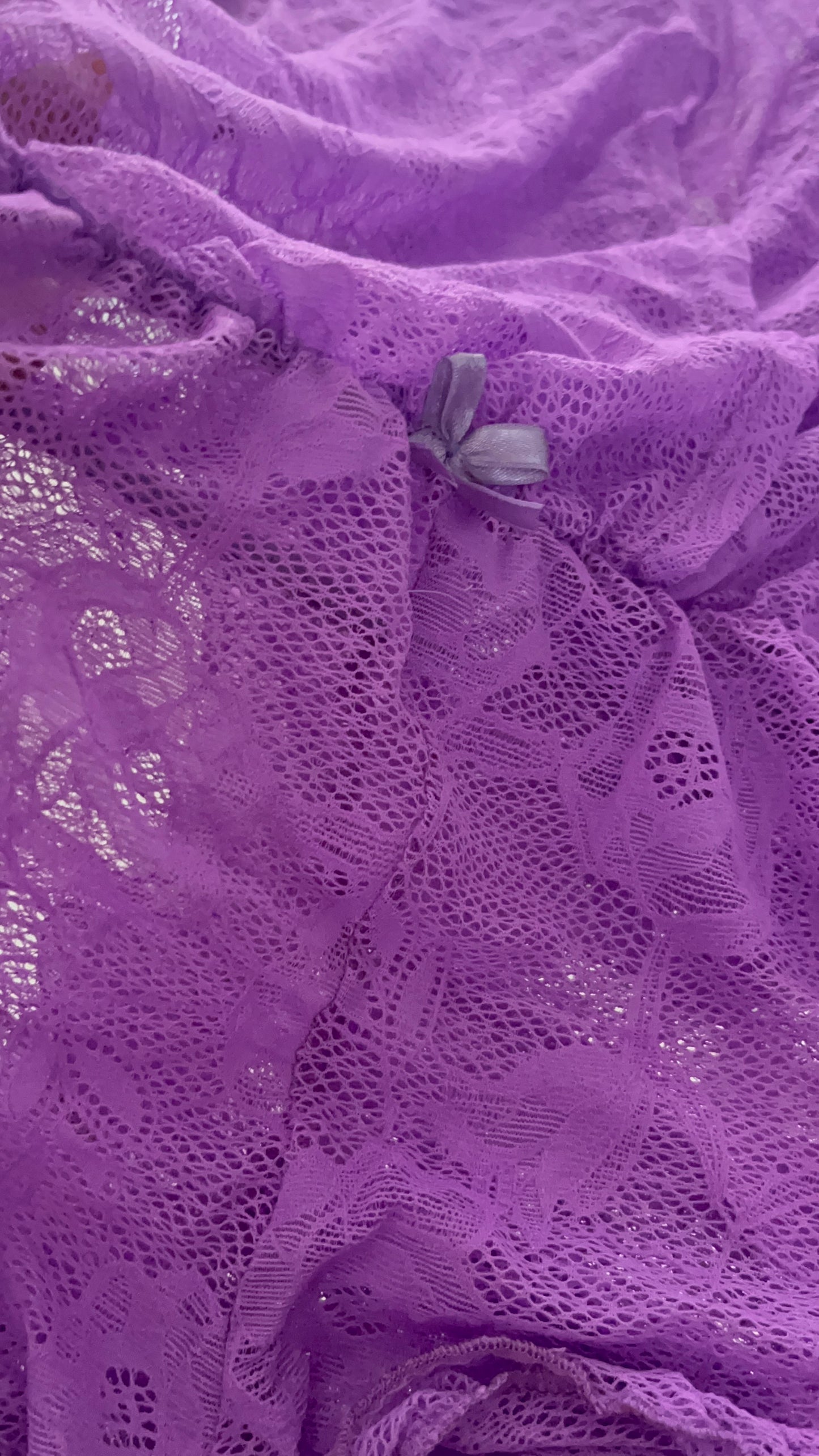 Wild Orchid lace romper with ruffle accents