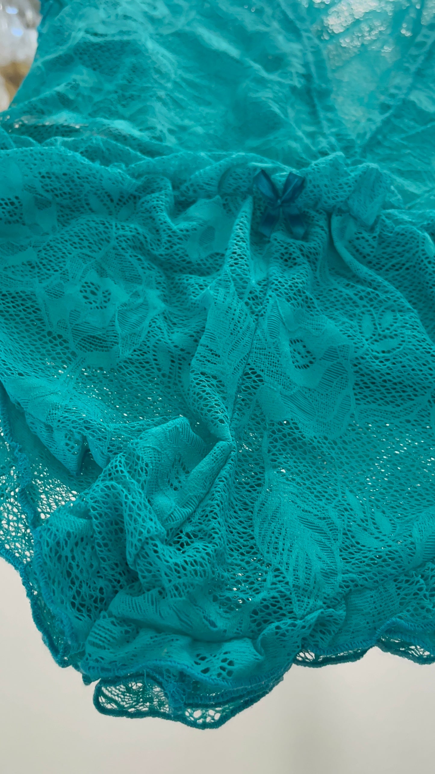 Wild Teal lace romper with ruffle trim detail
