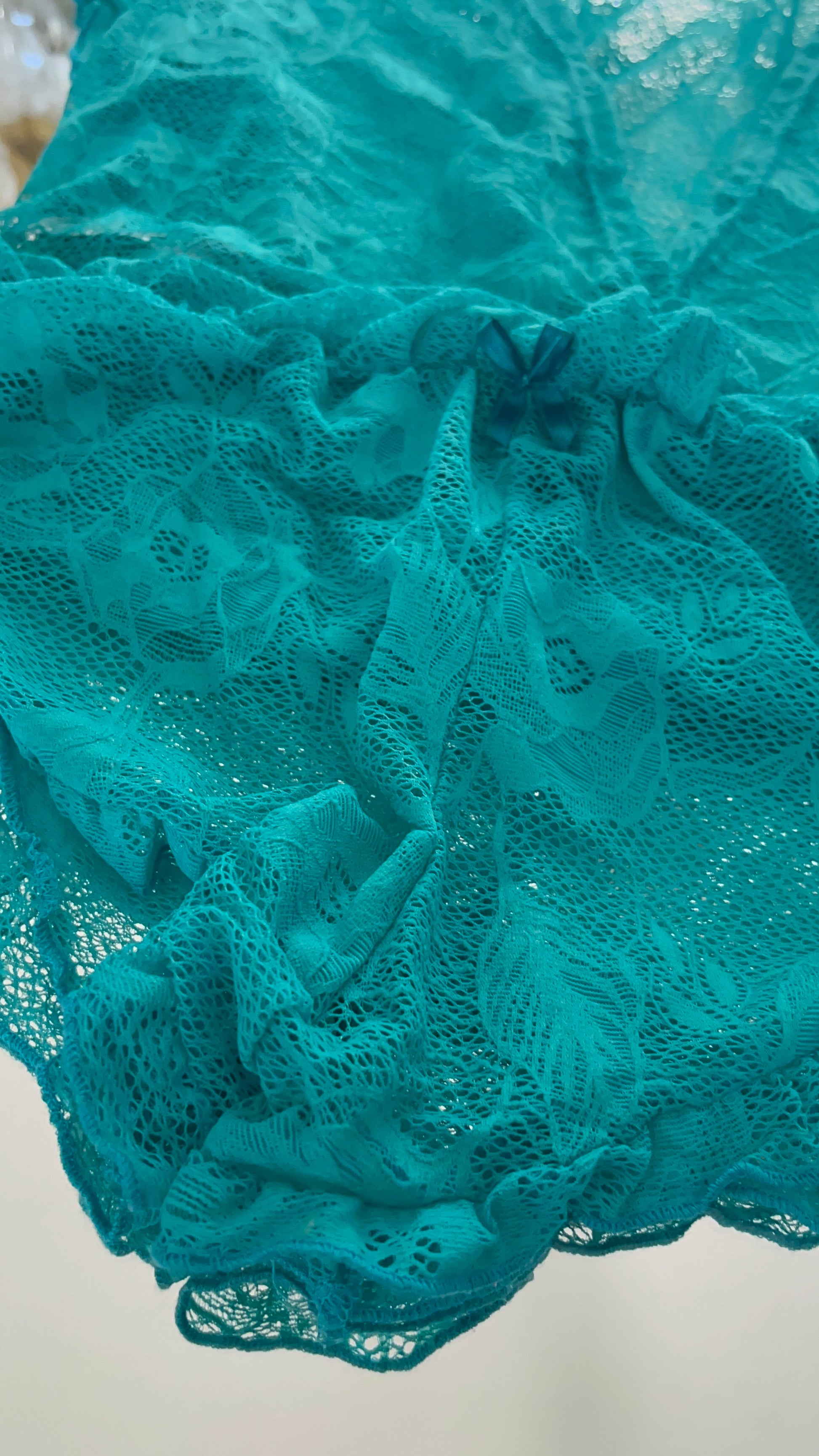 Wild Teal lace romper with ruffle trim detail